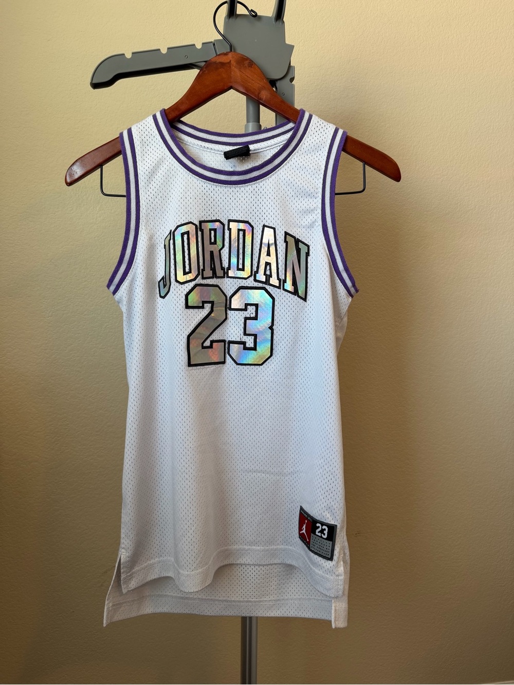 Jordan White Basketball Jersey with Purple Trim and Holographic Lettering
